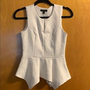 White sleeveless peplum top